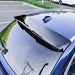 Black boot spoiler for BMW F11 2011-2017 mounted on white wagon roof