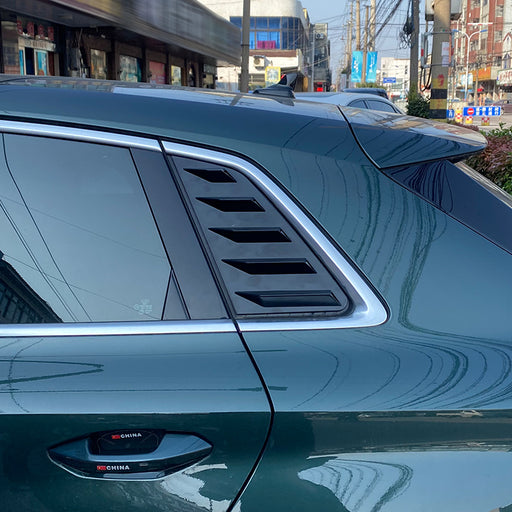 Black Bagrude lameller louvre cover installed on Audi A3 8Y, featuring horizontal slats on window panel