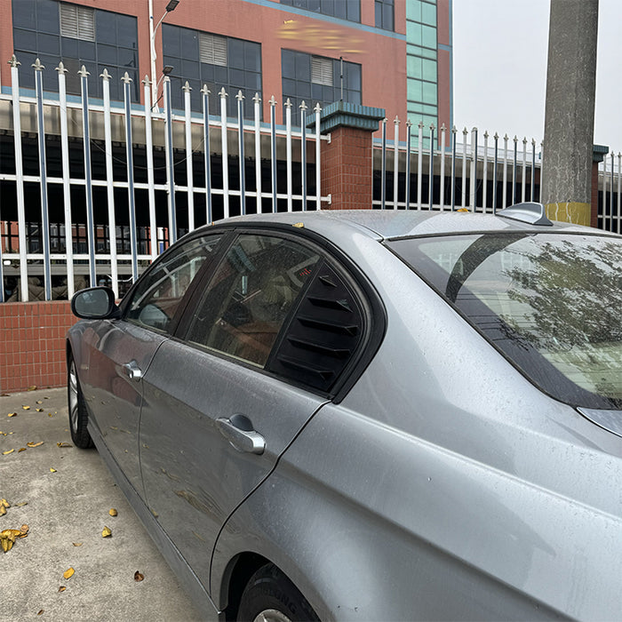 Silver BMW E90 with Bagrude black lameller cover window shade installed
