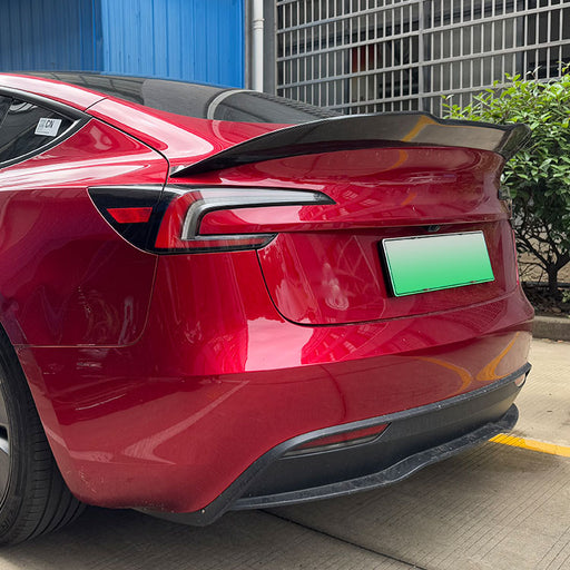 Black PSM Style baggspoiler installed on red Tesla Model 3 2023+ rear trunk
