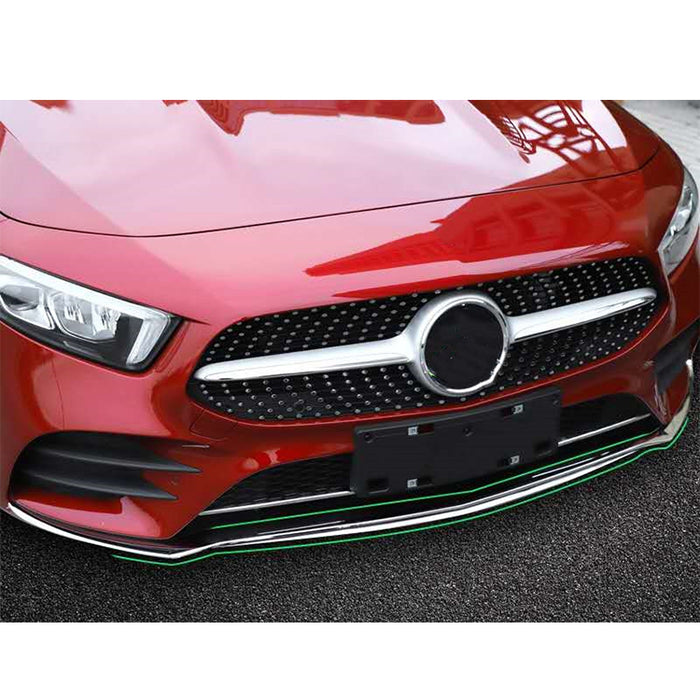Black front splitter with green accent for Mercedes A-Klasse Sedan A200 W177 installed on red car