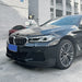 Black BMW 5-Series G30 with installed MP Style gloss black front splitter aerodynamic trim
