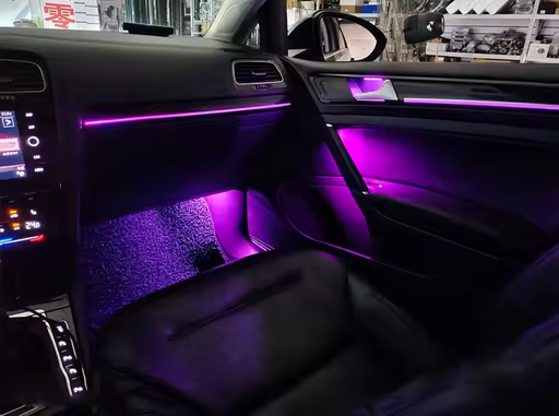 Purple ambient LED lighting kit installed in Volkswagen Golf 7 dashboard and interior trim