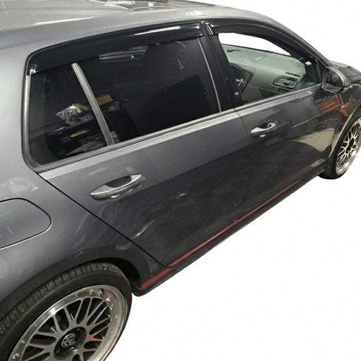 Golf 7/7.5 Hatchback black wind deflector installed on rear door window